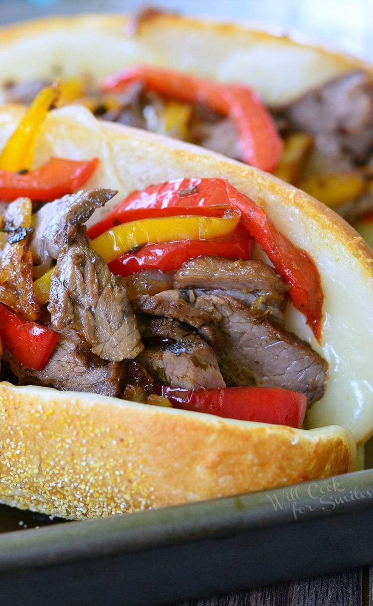 Fajita Philly Steak Sandwich with steak, red and yellow bell peppers, with onions on a hoagie roll 