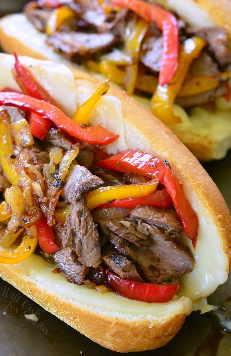 Fajita Philly Steak Sandwich with steak, red and yellow bell peppers, with onions on a hoagie roll 