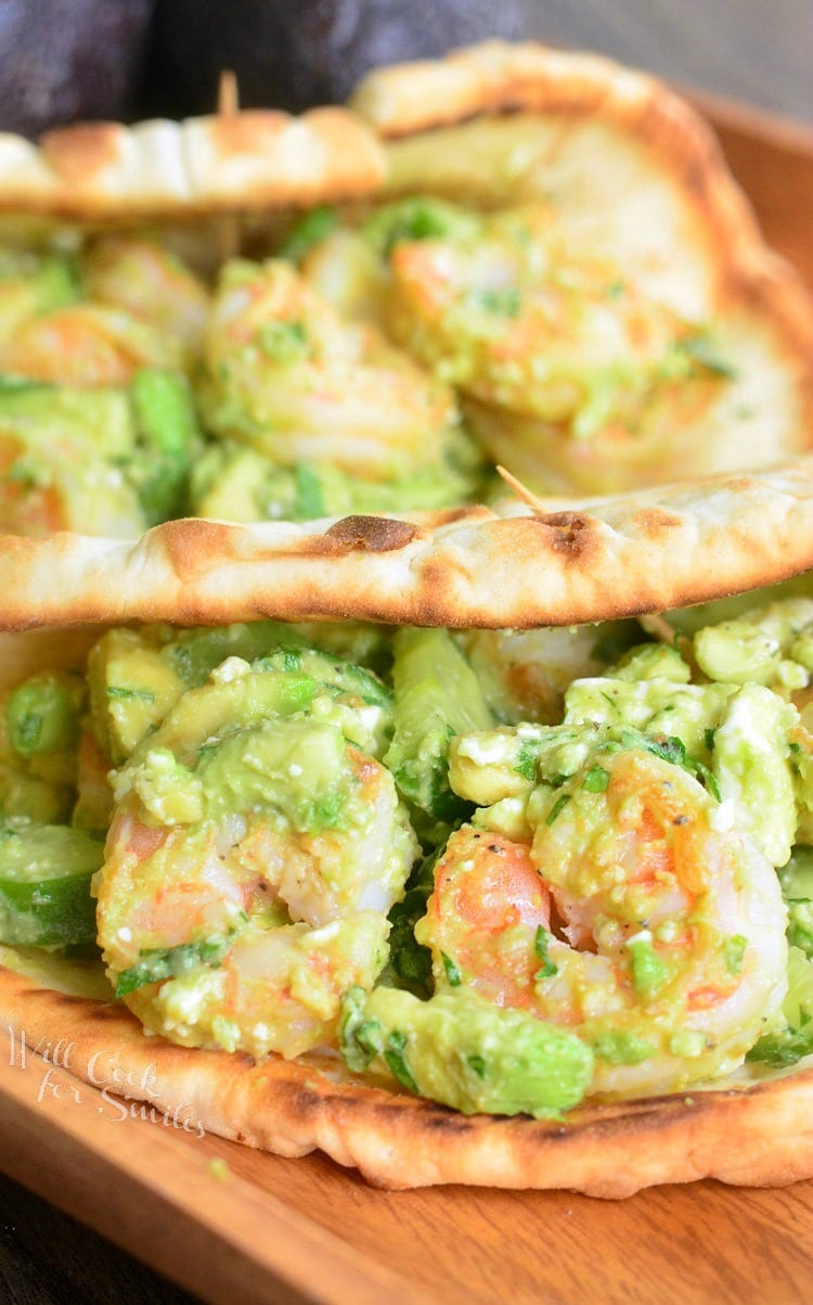 Avocado Shrimp Flatbread Sandwich on a cutting board 