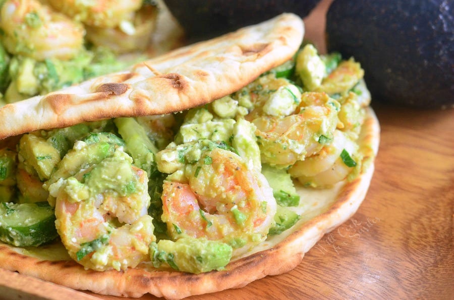 Avocado Shrimp Flatbread Sandwich on a cutting board 