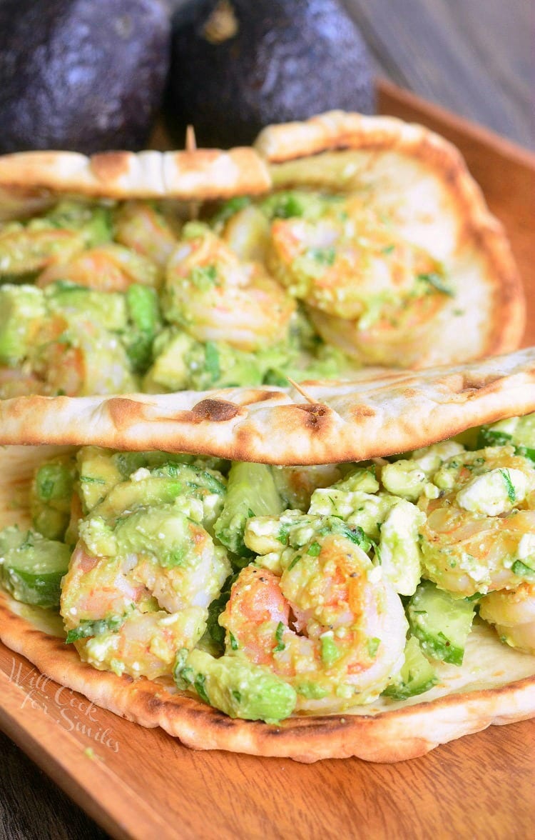 Avocado Shrimp Flatbread Sandwich on a cutting board 