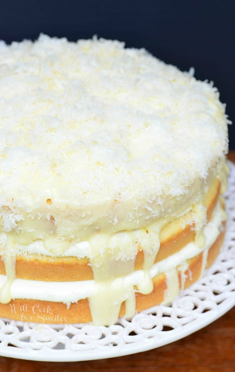 White Chocolate Coconut Cake on a cake stand 