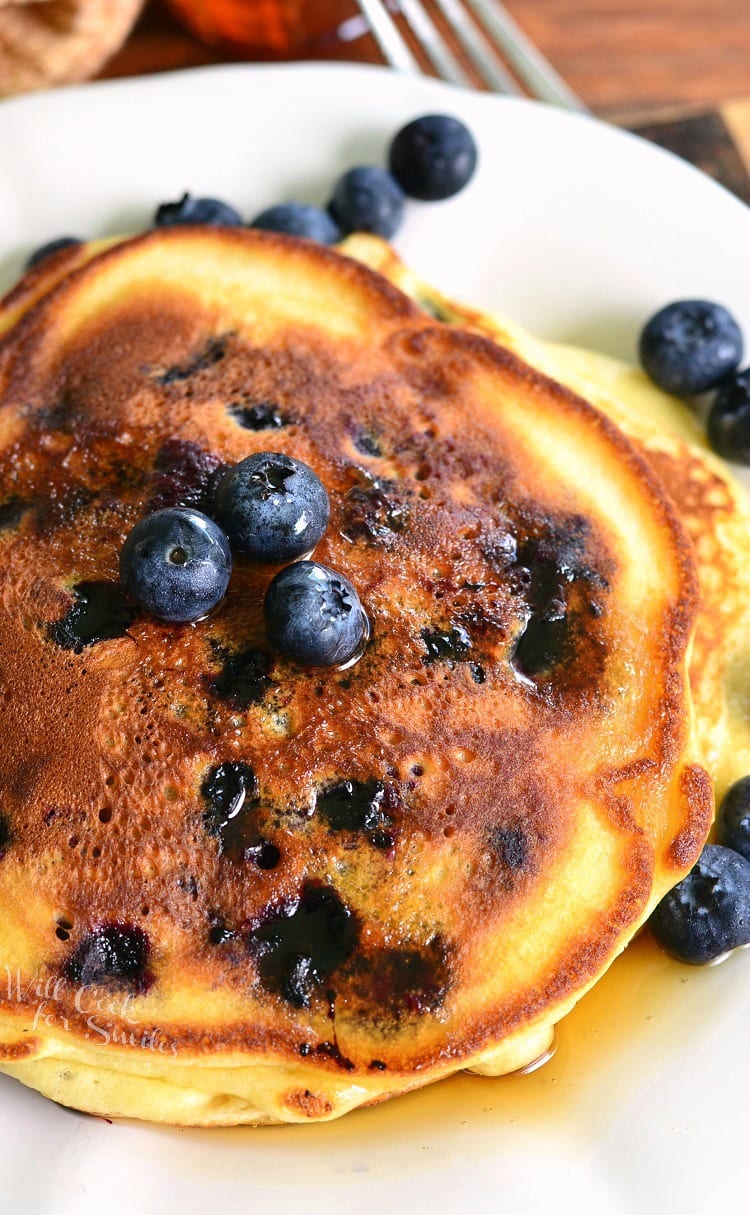 cooked blueberry pancakes on the plate view from the top