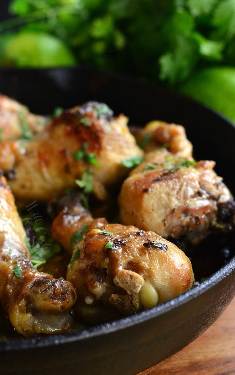 Coconut Lime Chicken Drumsticks in a cast iron skillet