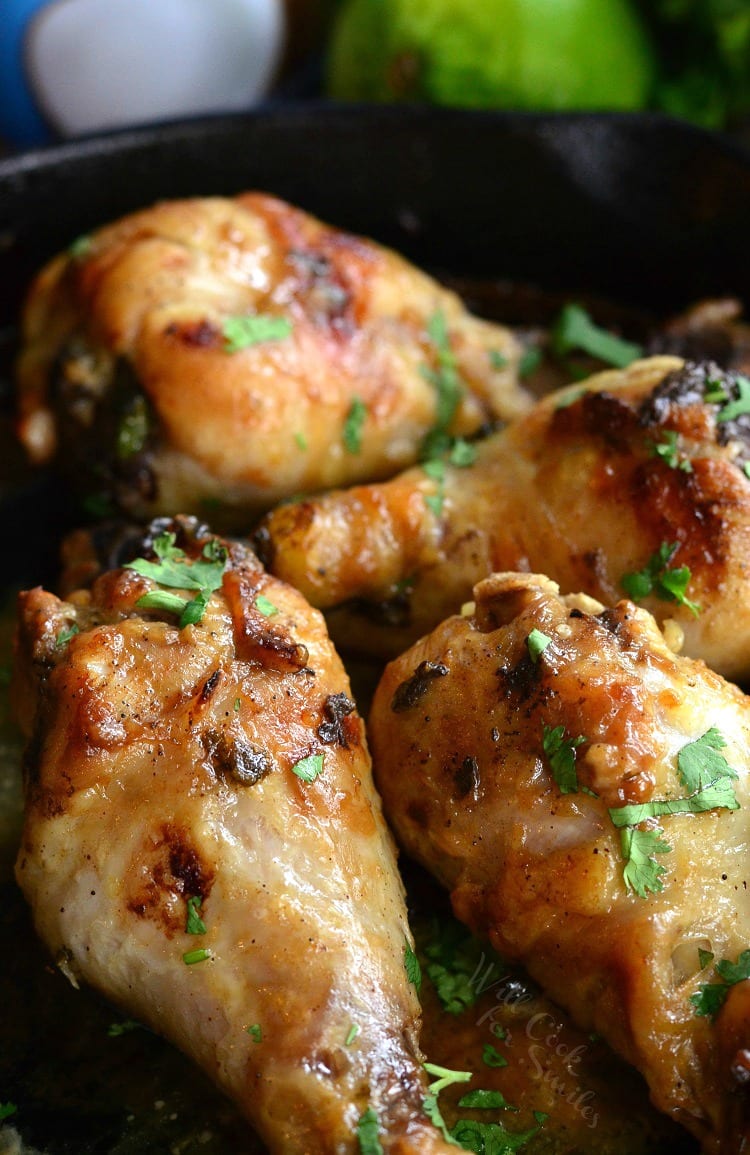 Coconut Lime Chicken Drumsticks in a cast iron skillet 