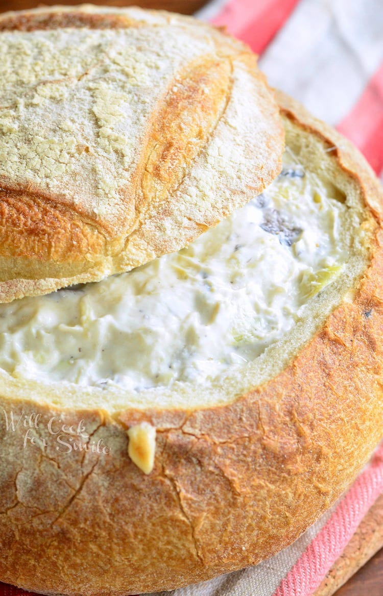 Fontina Mushroom Artichoke Dip in a bread bowl 