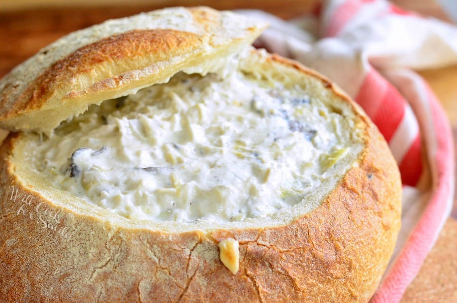 Fontina Mushroom Artichoke Dip in a bread bowl 