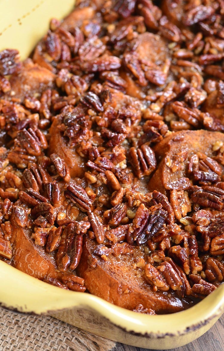 Pecan Pie French Toast Casserole in a yellow casserole pan 