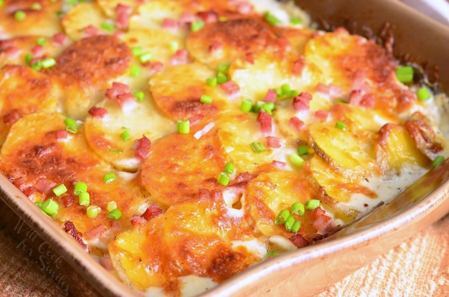 Chicken Cordon Bleu Scalloped Potatoes in a brown casserole dish 