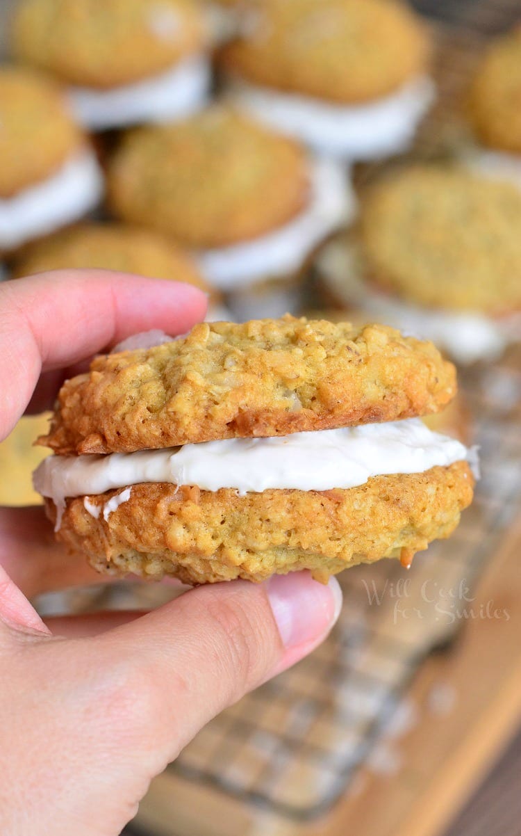 holding a Coconut Oatmeal Cookie Sandwich