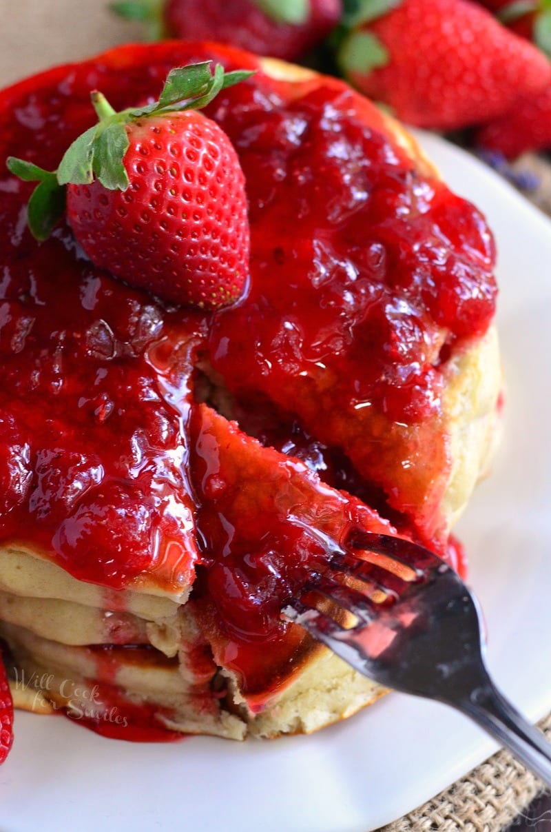 These homemade pancakes are made with fresh strawberries and lavender inside and topped with a freshly made strawberry lavender topping. 