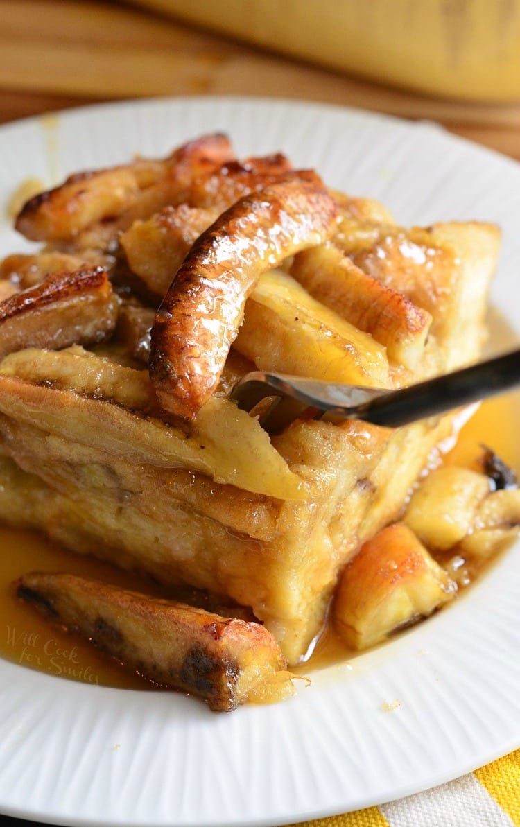 banana foster bread pudding on a plate.