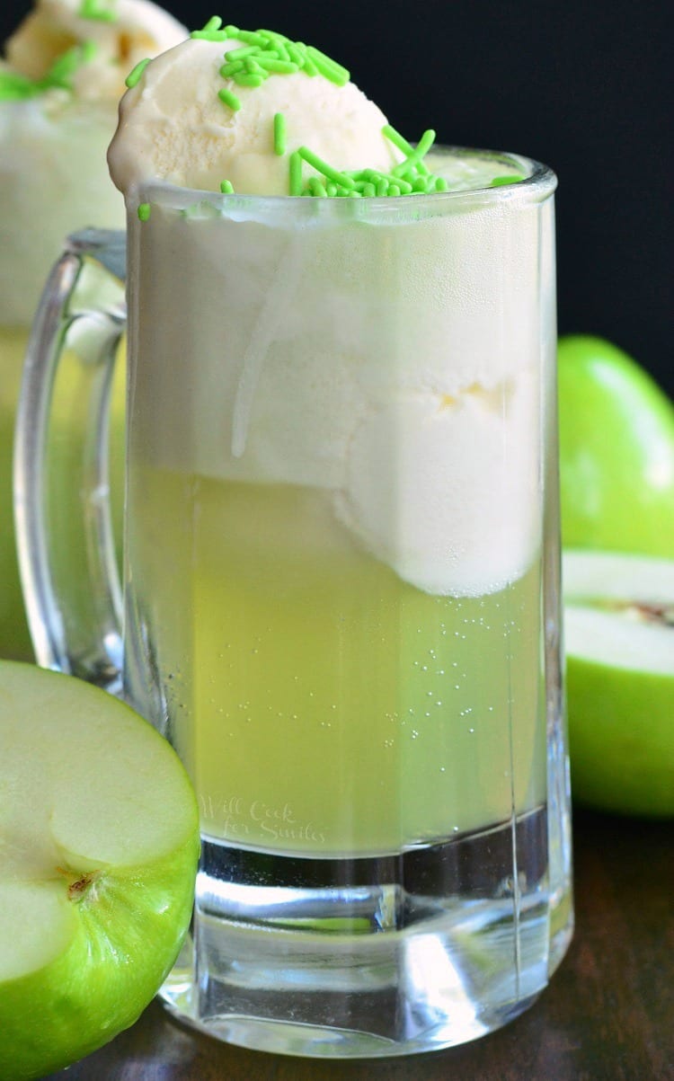 Green Apple Ice Cream Soda Float in a glass mug with green sprinkles on top 