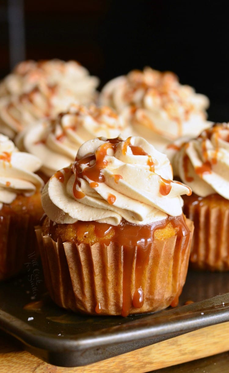 Salted Caramel Carrot Cake Cupcakes on a baking sheet