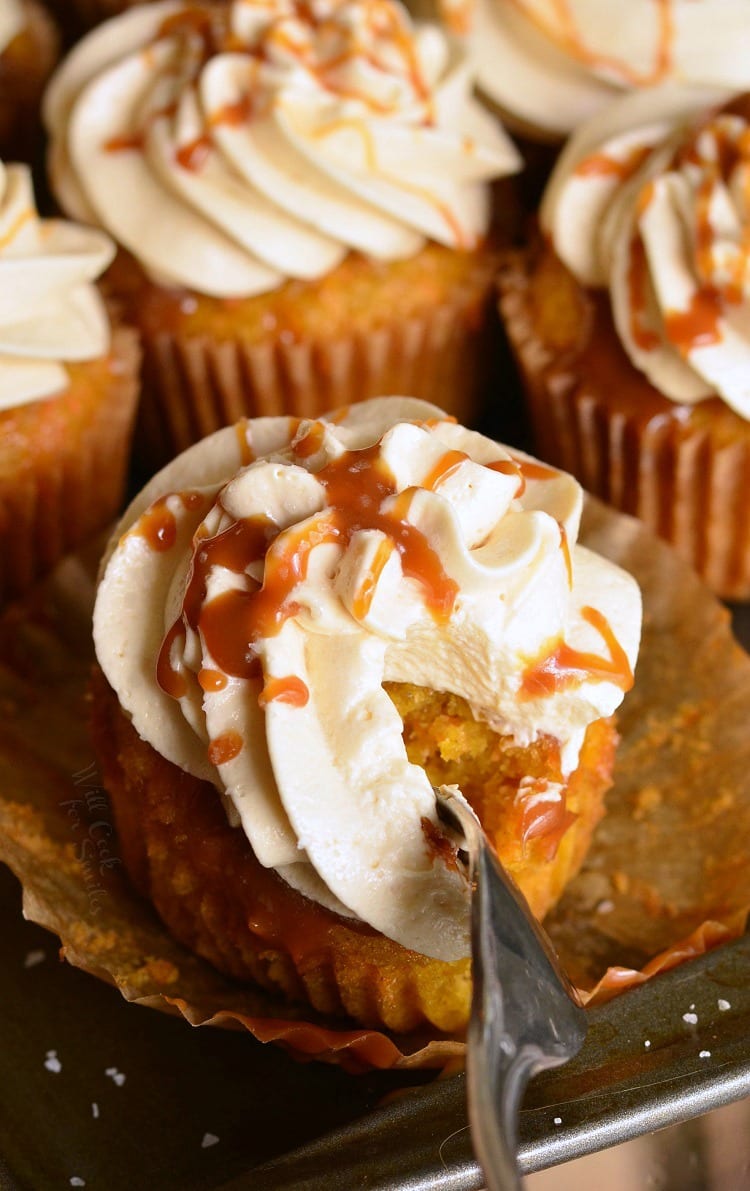 Salted Caramel Carrot Cake Cupcakes with a fork on a baking sheet