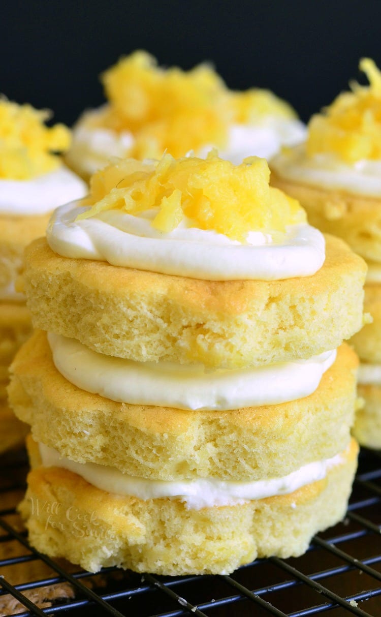Mini Pineapple Cakes with Silky Cream Cheese Frosting on a cooling rack
