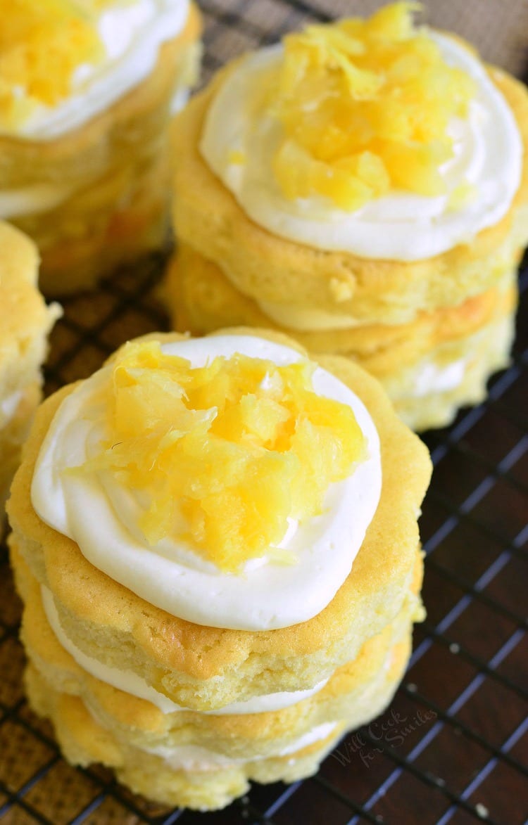 top view photo of Mini Pineapple Cakes with Silky Cream Cheese Frosting on a cooling rack 