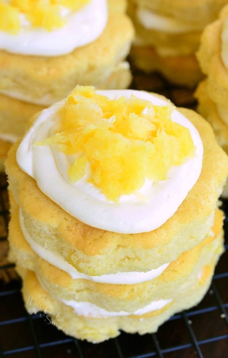 top view photo of mini Pineapple Cakes with Silky Cream Cheese Frosting on a cooling rack 