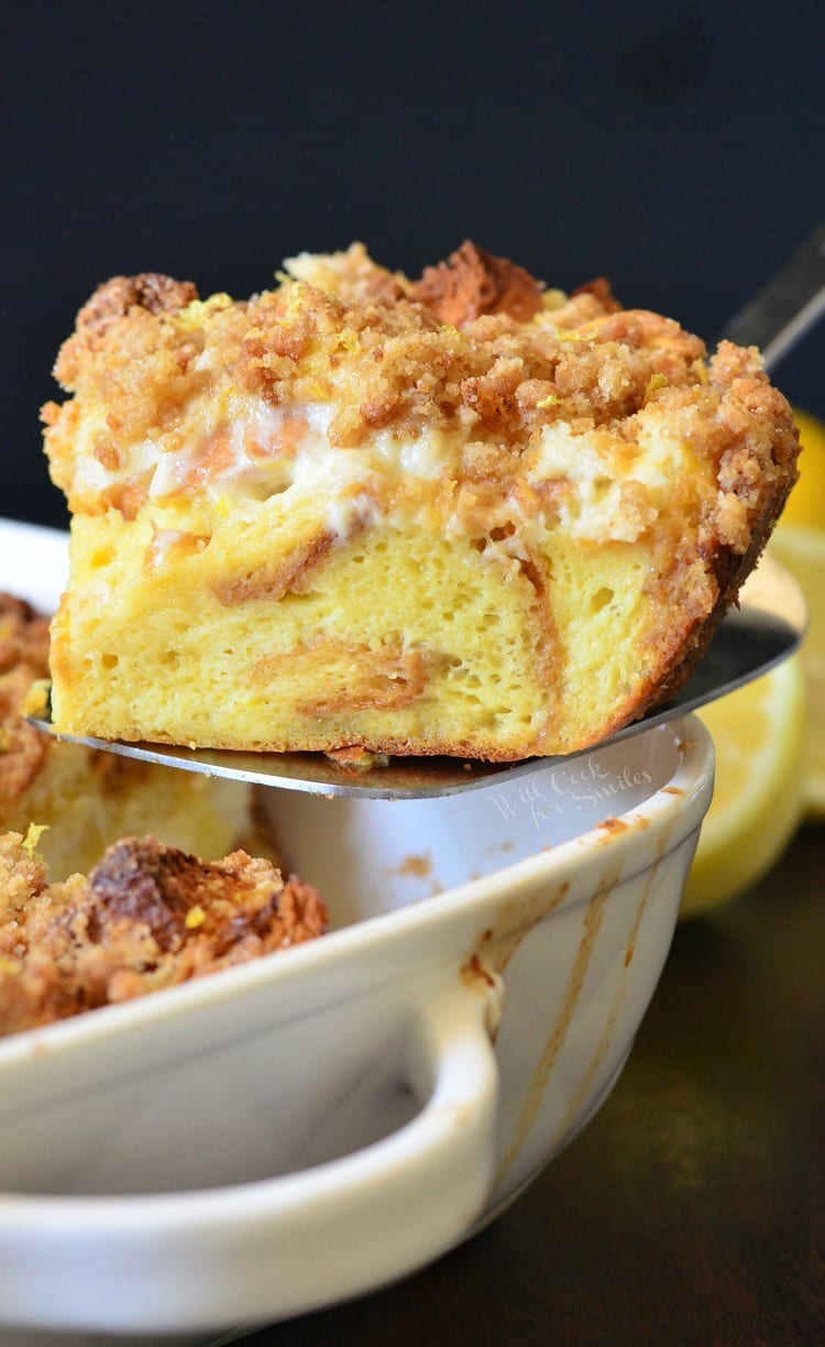 close up of Lemon cheesecake slice on a spatula.