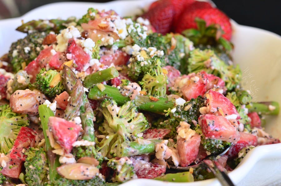 Strawberry Asparagus Broccoli Salad in a white bowl 