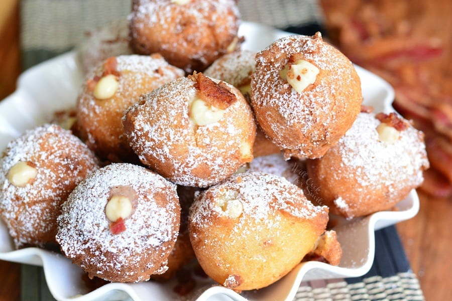 Bacon Brown Sugar Cream Doughnut Holes in a bowl on a placemat 