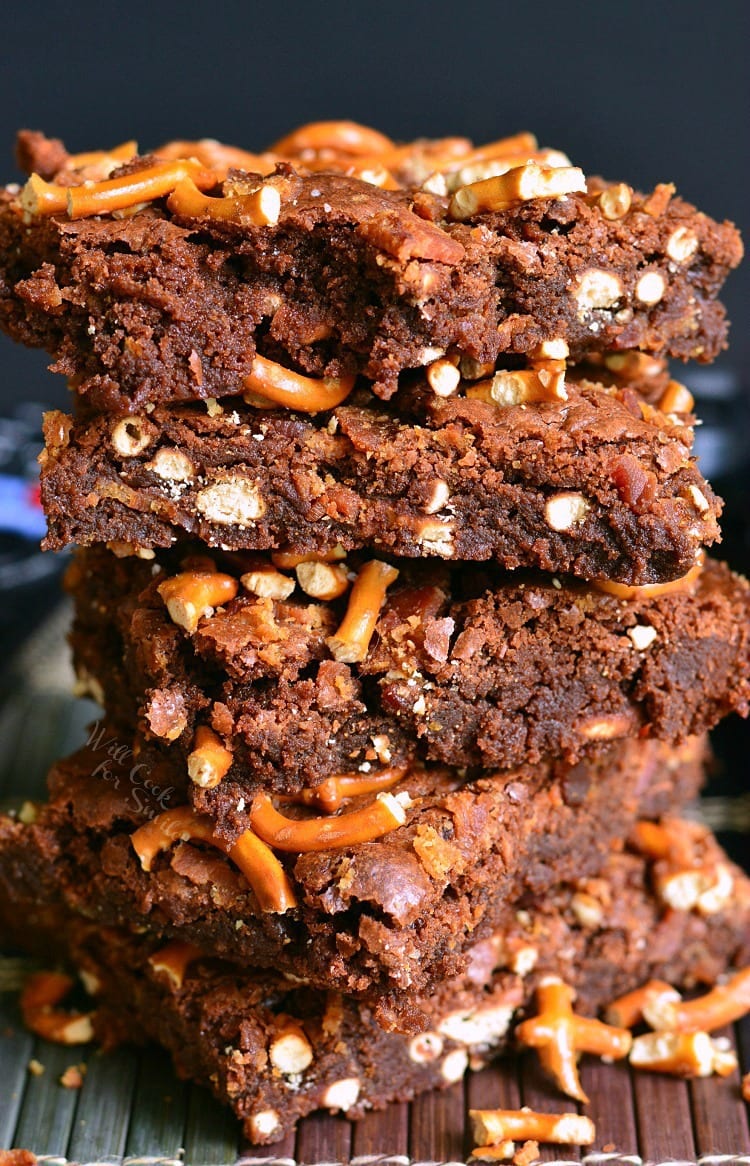 Pretzel Bacon Brownies staked on a plate 