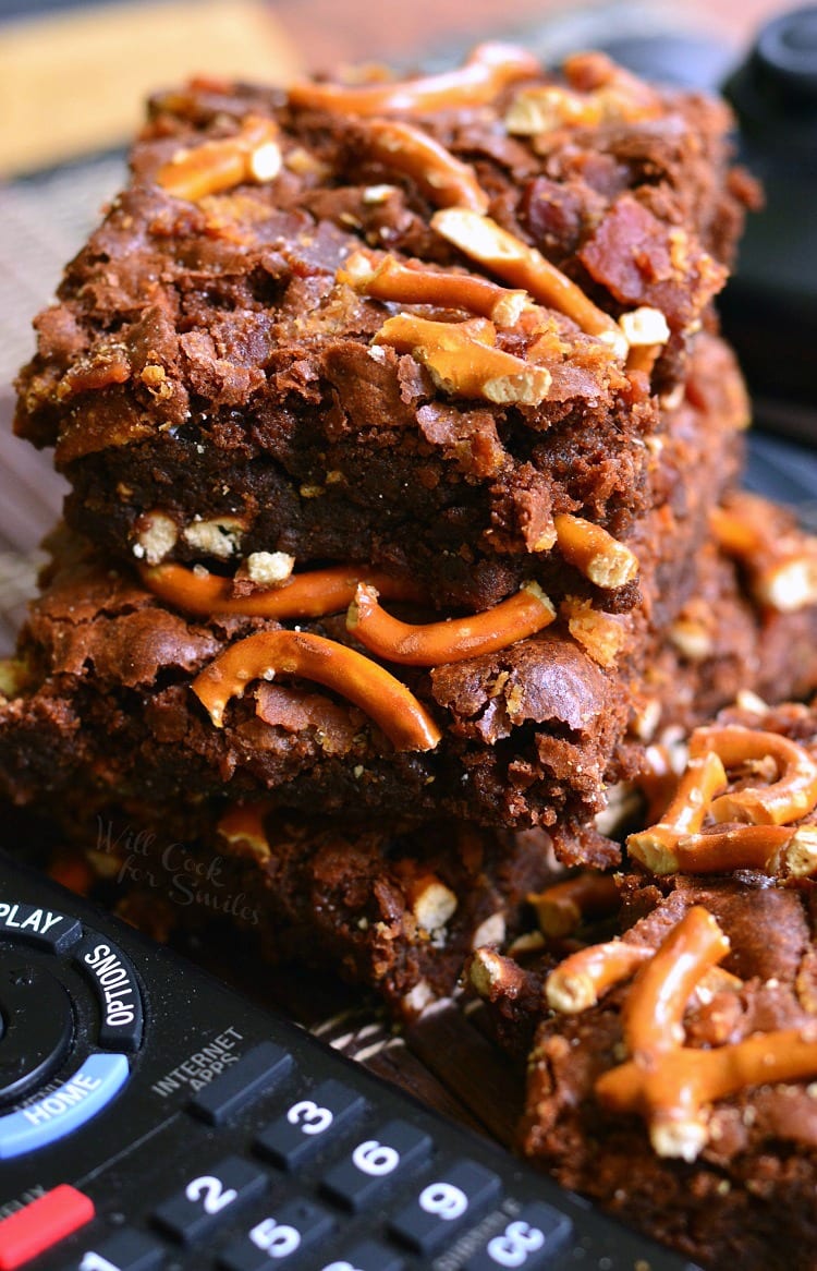 Dad's Brownies aka Pretzel Bacon Brownies on a table with a remote 