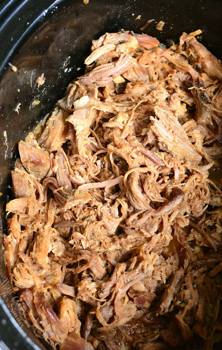 Pulled Pork in a slow cooker with the top off 