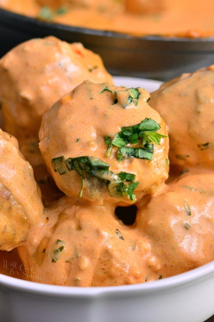 Creamy Tomato Basil Meatballs in a bowl 