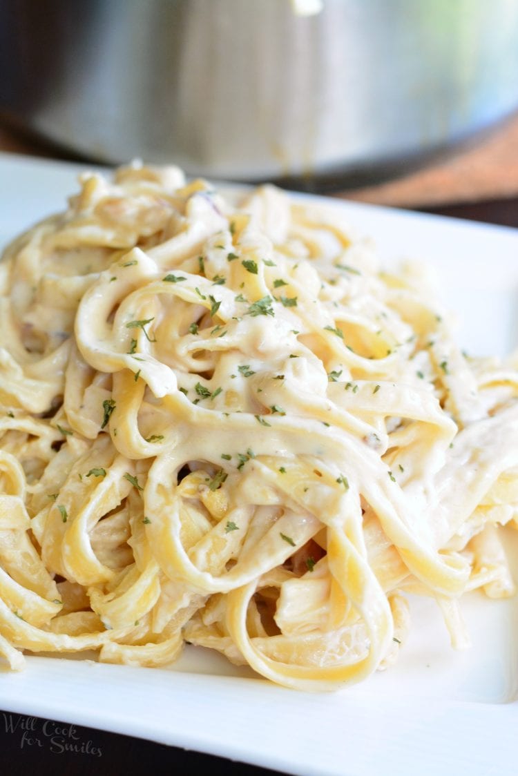 Roasted Garlic Asiago Fettuccine on a white plate 