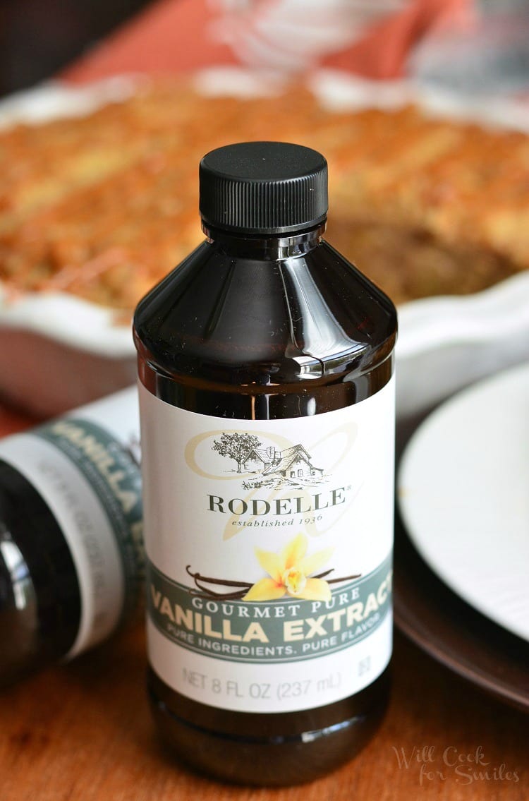 a bottle of Rodelle vanilla extract with the pie in the background 