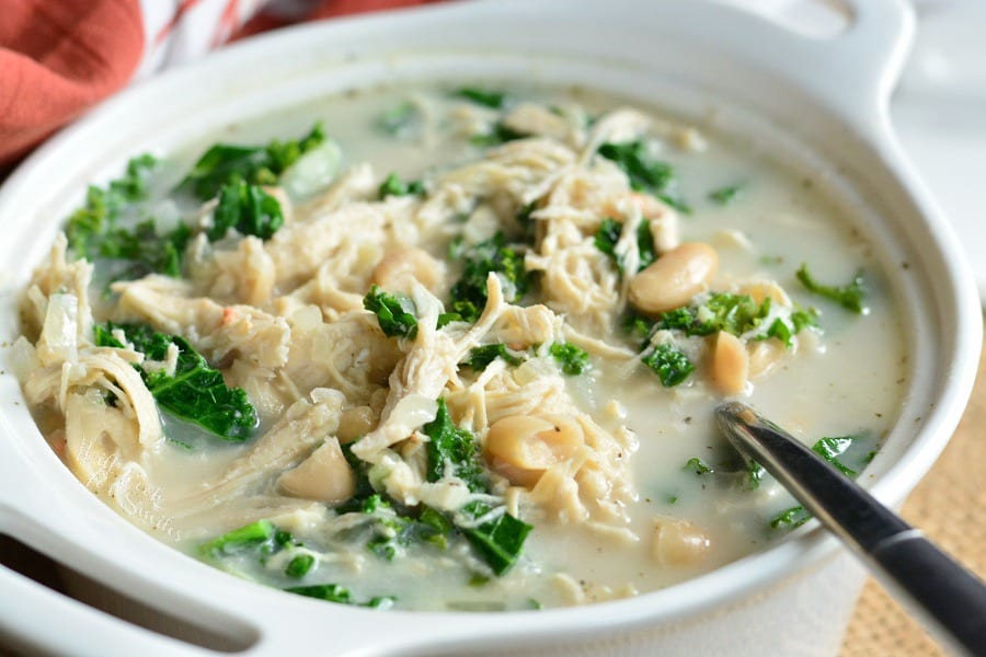 Creamy Chicken and Bean Soup in a bowl with a spoon 