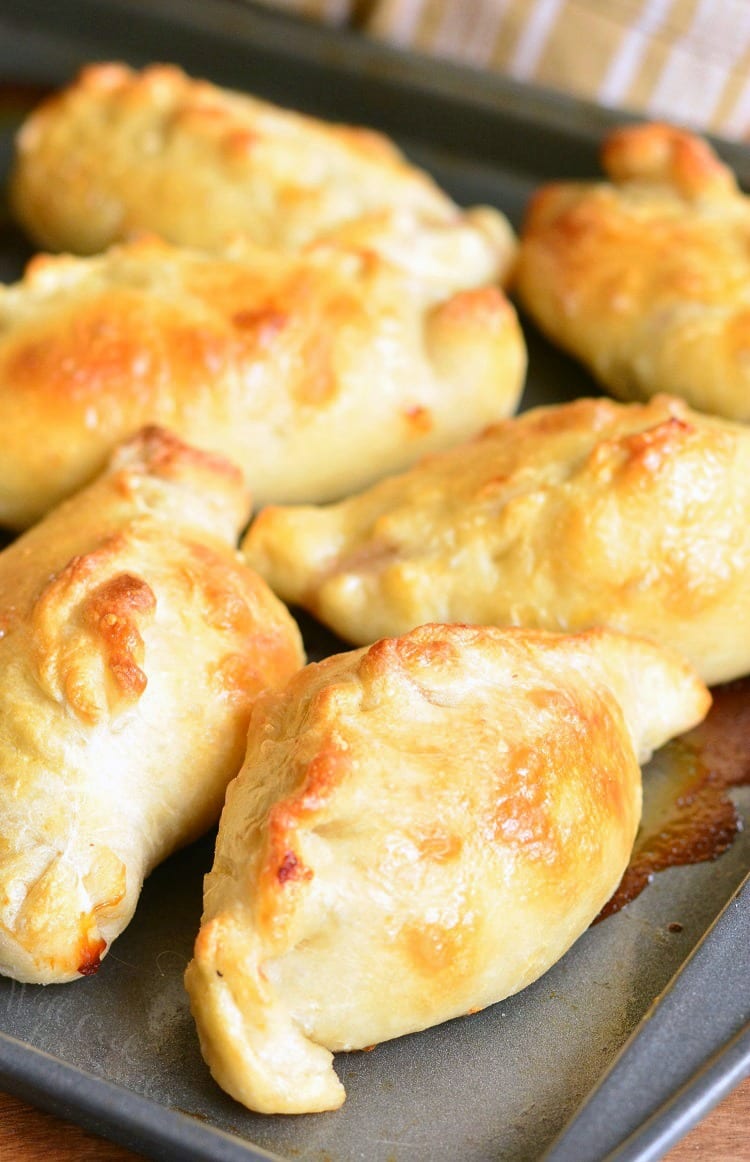 Turkey Cranberry Baked Piroshki on a baking sheet 