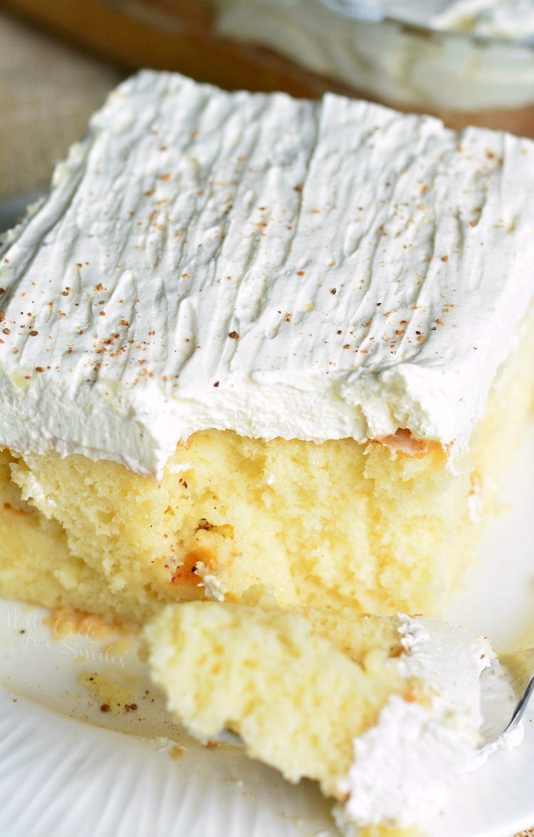 Eggnog Poke Cake on a plate with a fork 