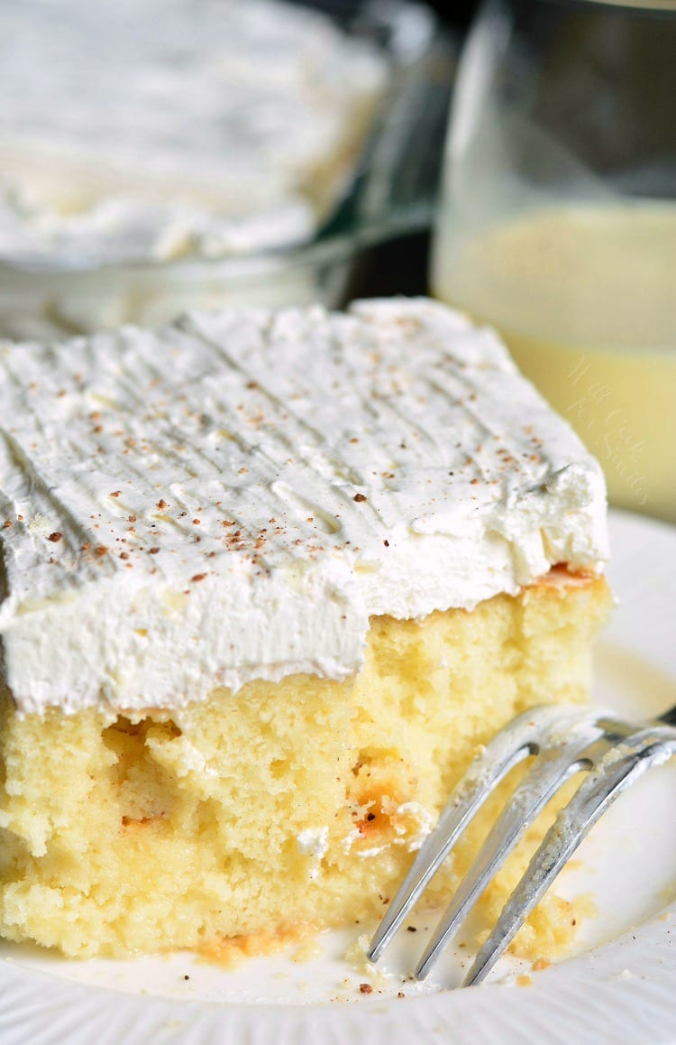 Eggnog Poke Cake on a plate with a fork 