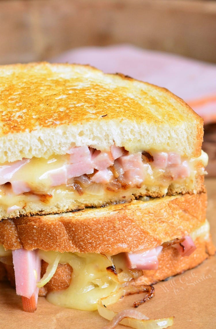 Ham and Brie Grilled Cheese Sandwich on a cutting board 