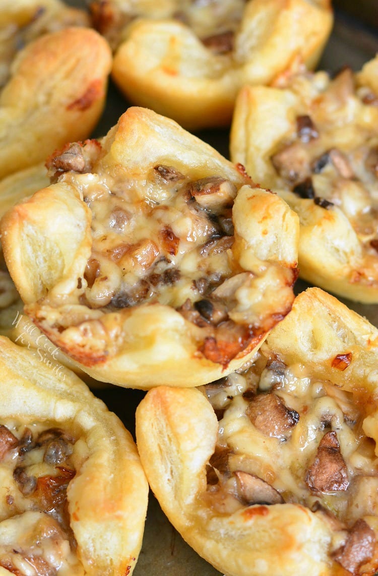 Mushroom Cheese Puff Bites. Buttery, cheesy, tasty little cups of mushroom filled pastry. Only 5 ingredients and 30 minutes of your time to get these heavenly mushroom cheese bites. #mushrooms #partyfood #puffpastry
