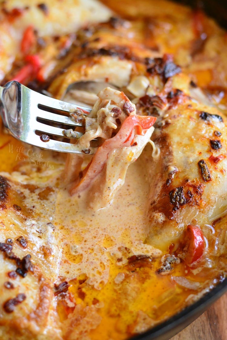 Creamy Chipotle Pepper Chicken Thighs with a fork 