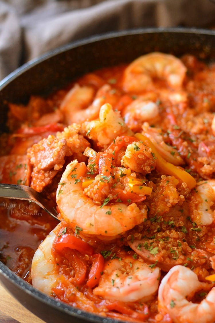 Smoked Sausage and Shrimp Jambalaya with Quinoa in a pan with a spoon 