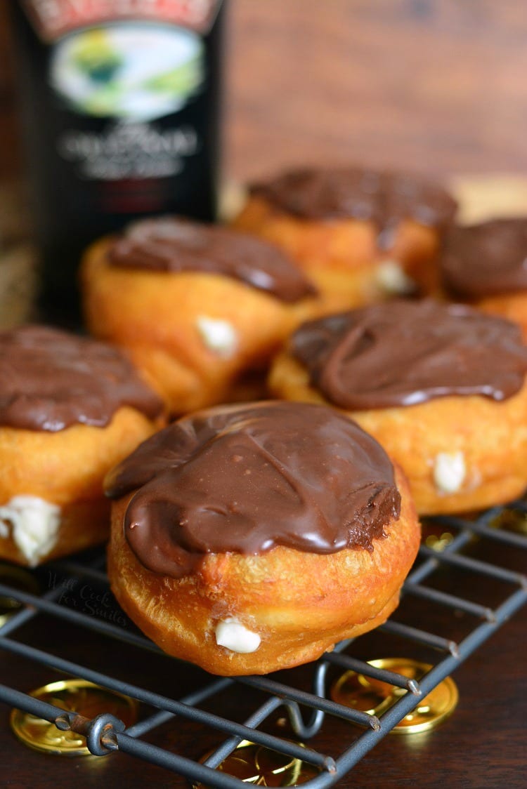Bailey's Cheesecake Doughnuts on a cooling rack 