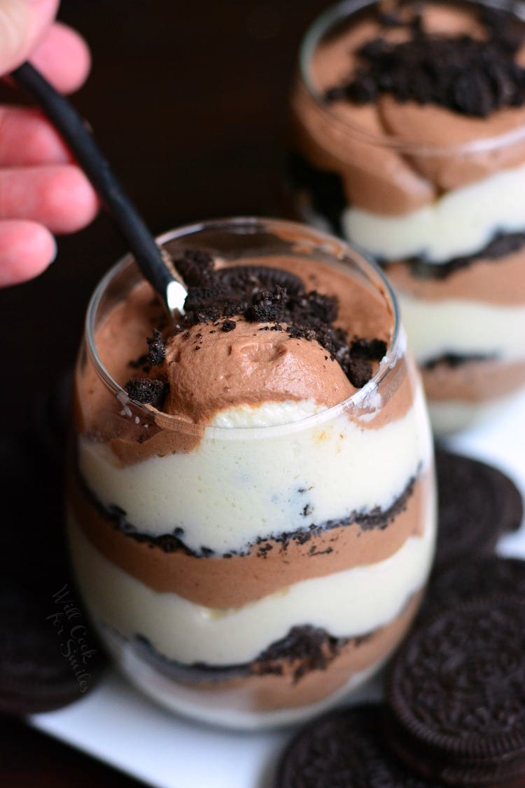 Oreo Double Chocolate Mousse Parfaits in a glass with a spoon 