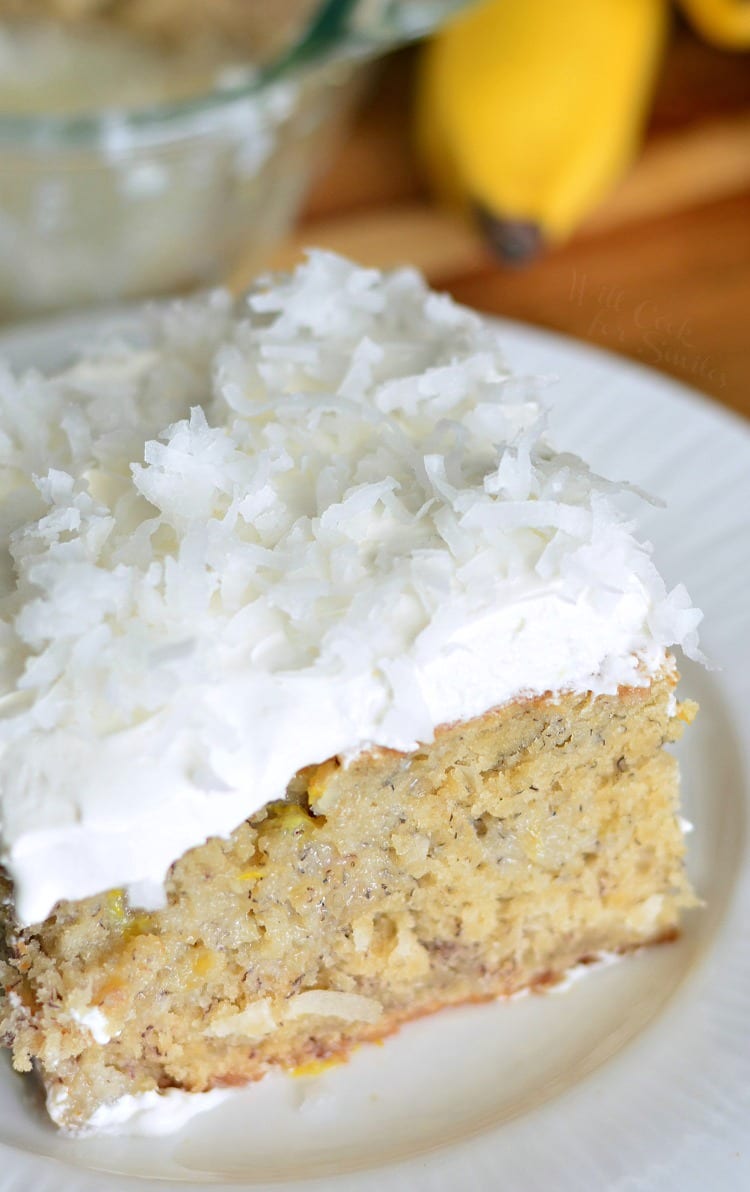 Lemon Coconut Banana Poke Cake on a plate 