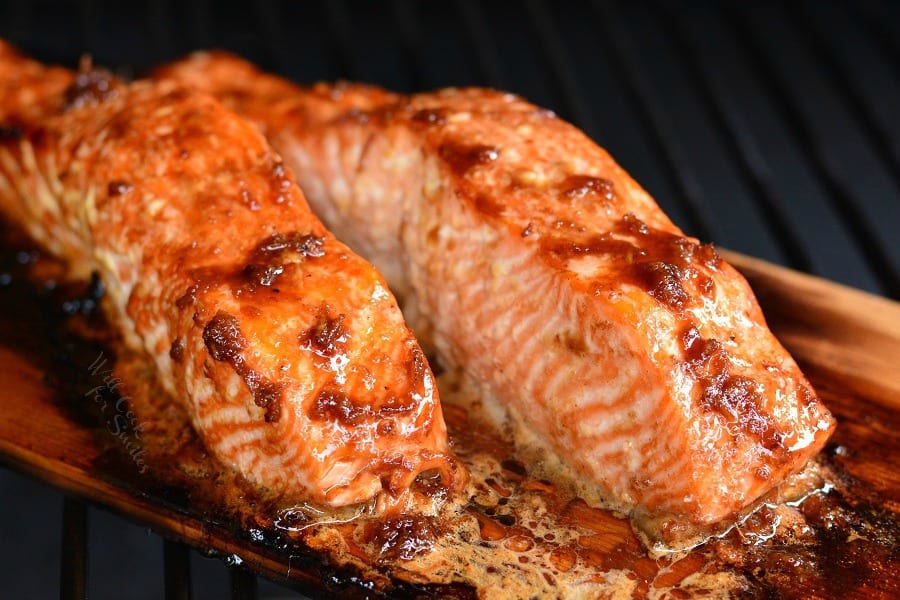 Honey Ginger Cedar Plank Salmon on a cedar plank on the grill 