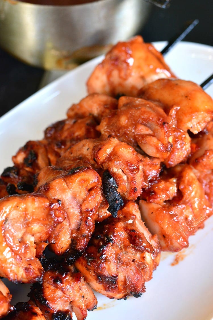 Grilled Spicy BBQ Chicken Skewers on a plate 