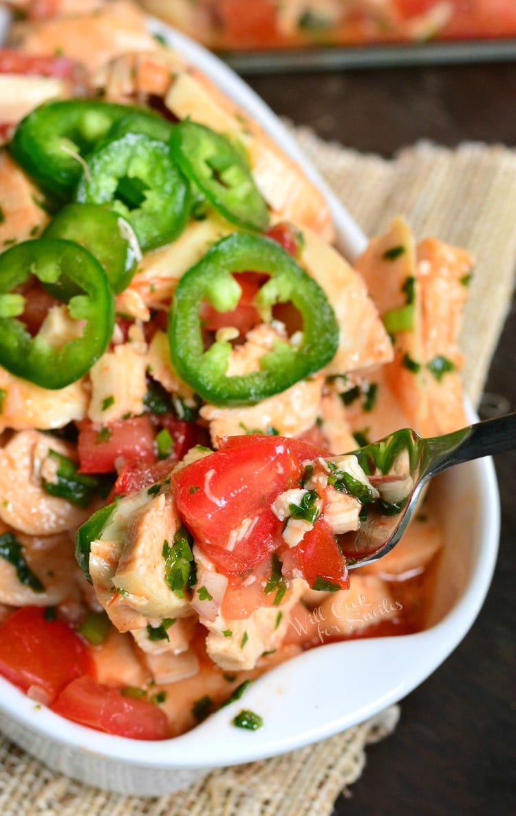 Spicy Mexican Chicken Salad in a serving bowl with a fork scooping some out 