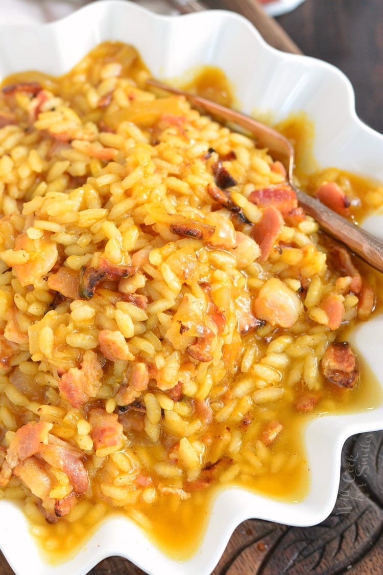 Bacon Onion and Pumpkin Risotto Recipe in a bowl with a fork 