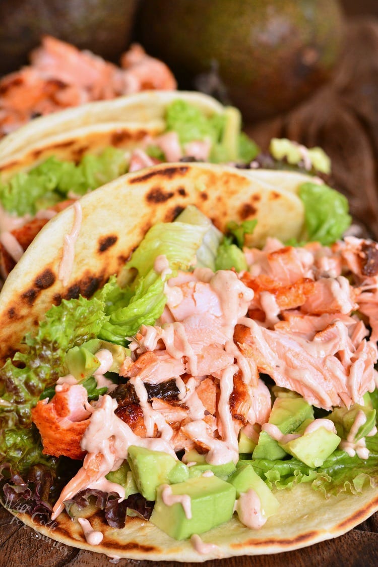 salmon tacos on a cutting board 