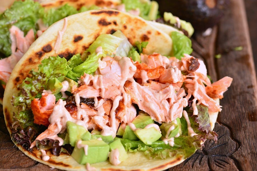 Easy Baked Salmon Tacos on a cutting board 