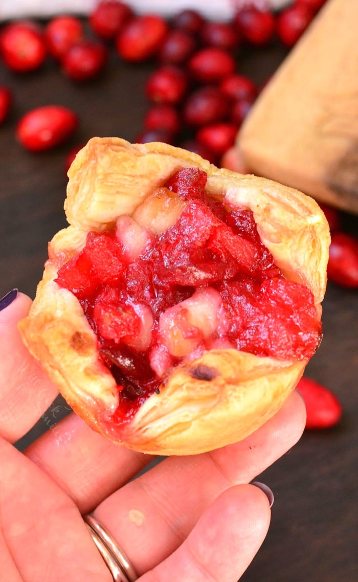 holding Apple Cranberry Brie Puff Pastry in my hand 