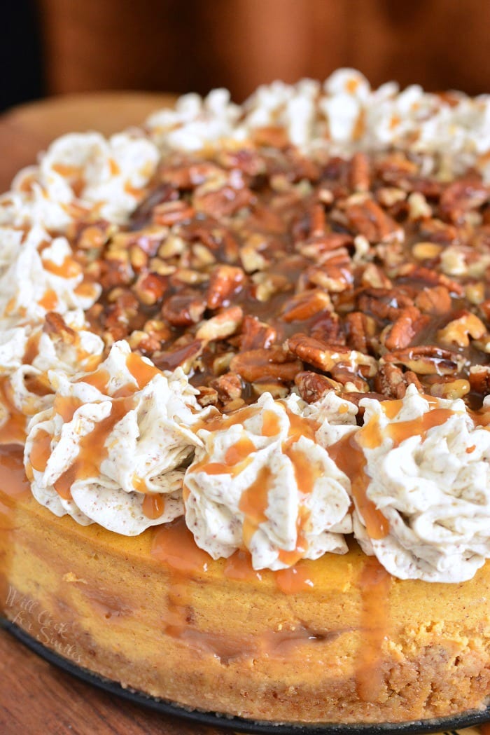 smooth and silky pumpkin cheesecake made with pecans, caramel, and frosting.